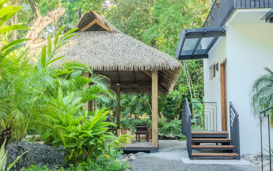 Tropical Resort Entrance with Traditional Thatched Gazebo and Modern Architecture