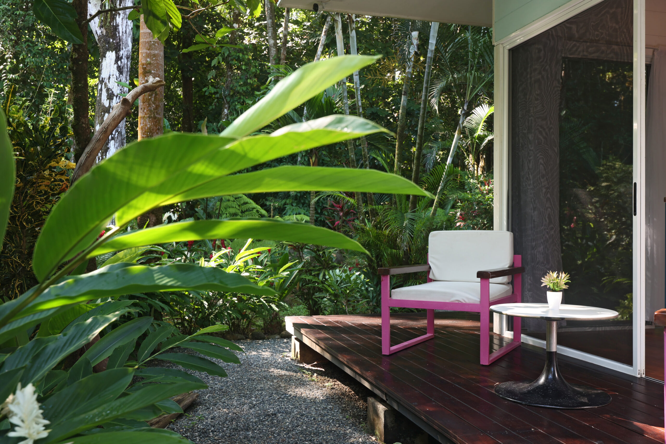 Cozy built-in reading nook with colorful pillows at Ojochal Gardens luxury villa